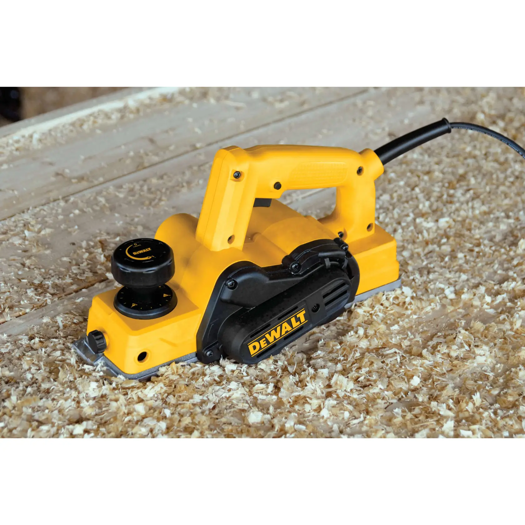 DEWALT Portable Hand Planer being used to cut a plank of wood