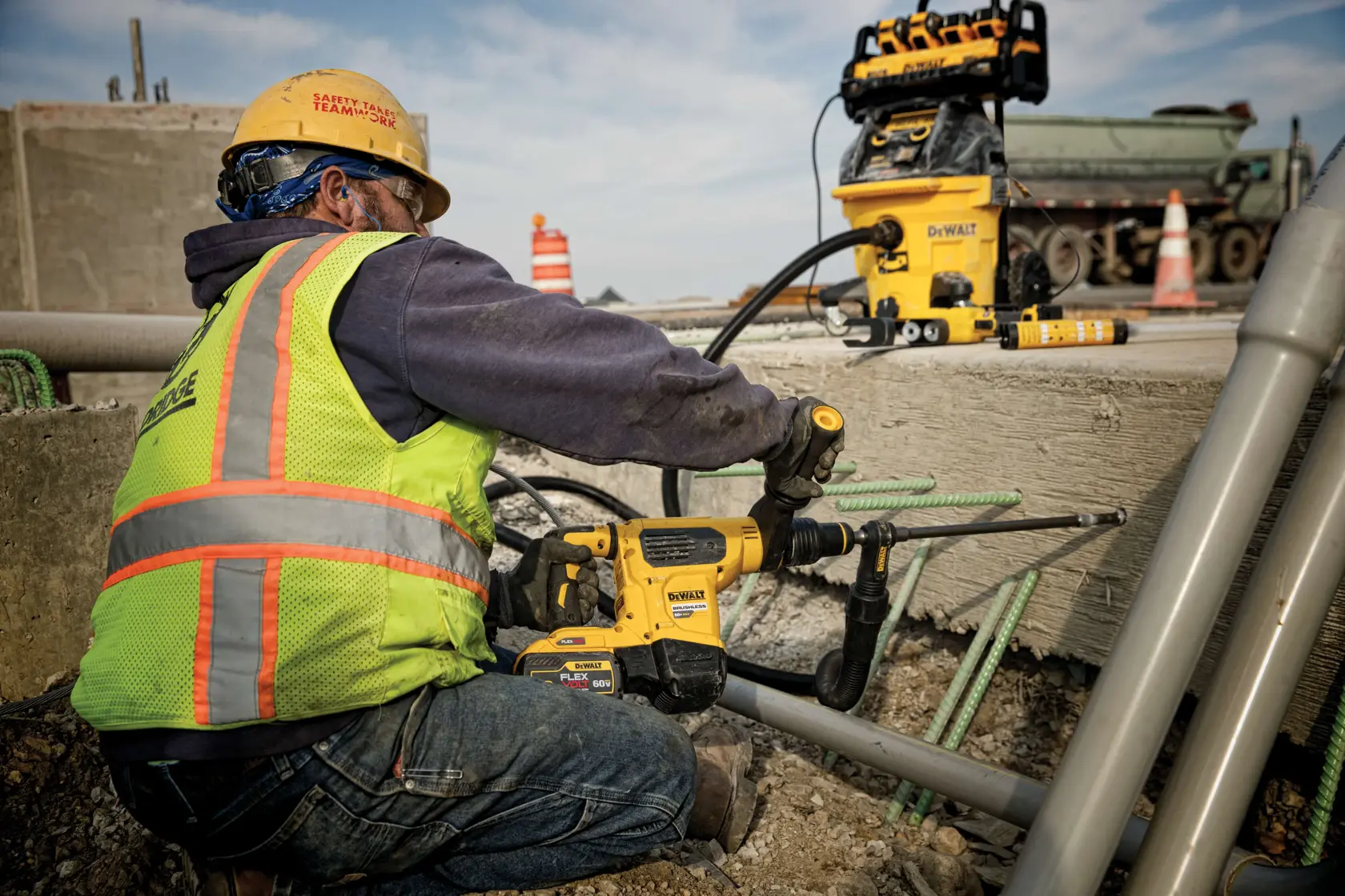 1800 Watt Portable Power Station and Battery Charger powering up a drill used by a construction worker at a construction site