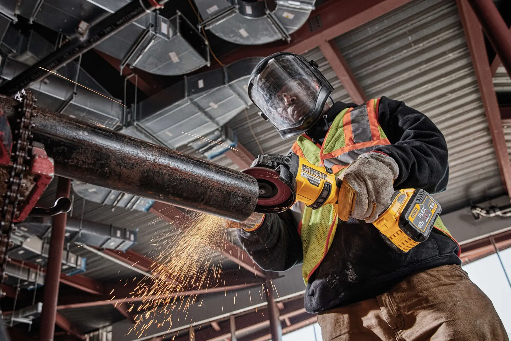 20 Volt to 60 Volt 9 AMP hours Lithium-Ion Battery-powered Polishing Tool being used by a construction worker to polish a metal rod at a construction site