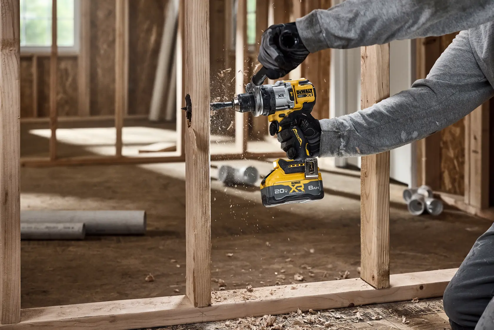 20V MAX* XR® Brushless Cordless 1/2 in. Hammer Drill drilling 2-9/16" hole for plumbing 