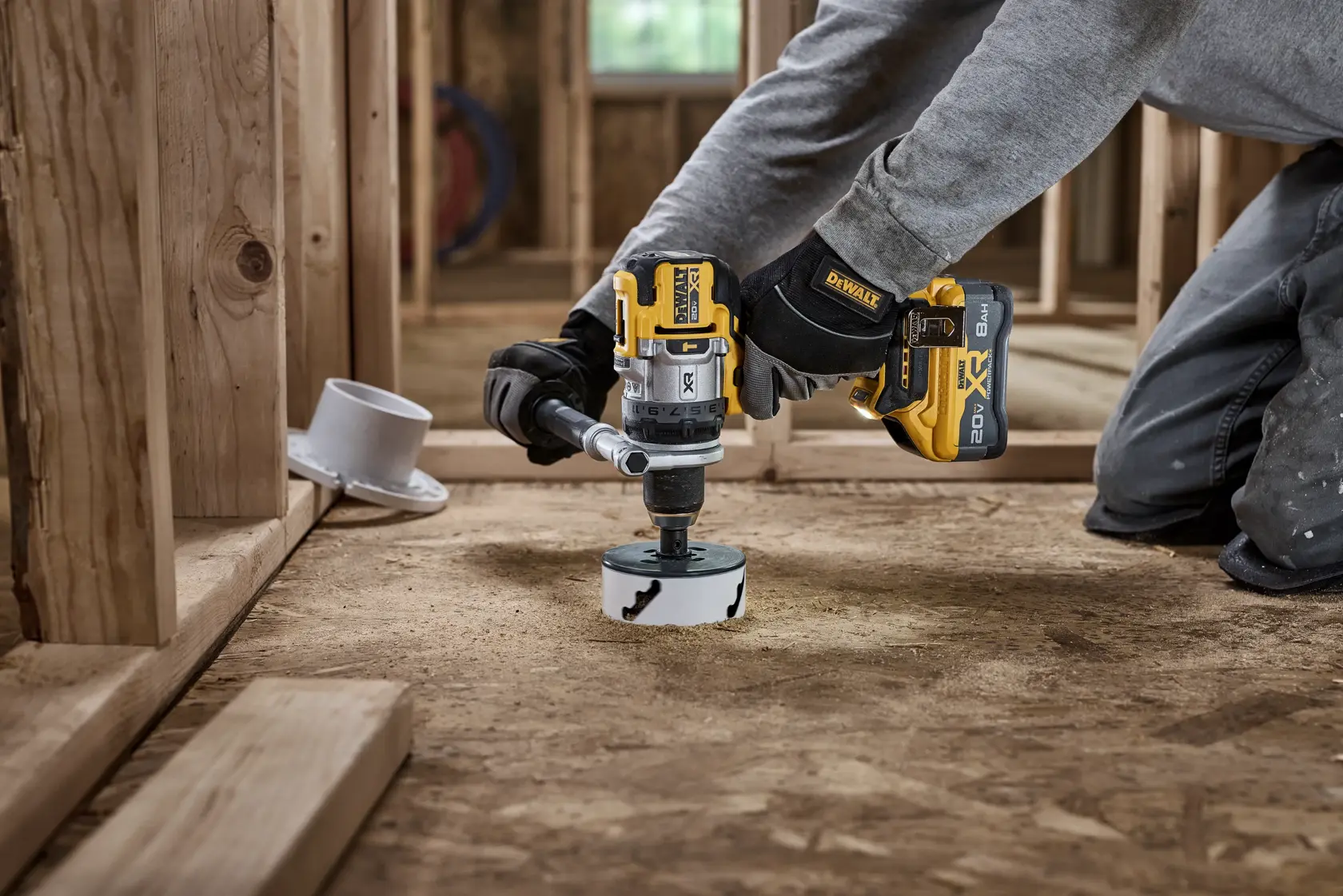 20V MAX* XR® Brushless Cordless 1/2 in. Hammer Drill drilling 4" hole for plumbing using a LENOX hole saw