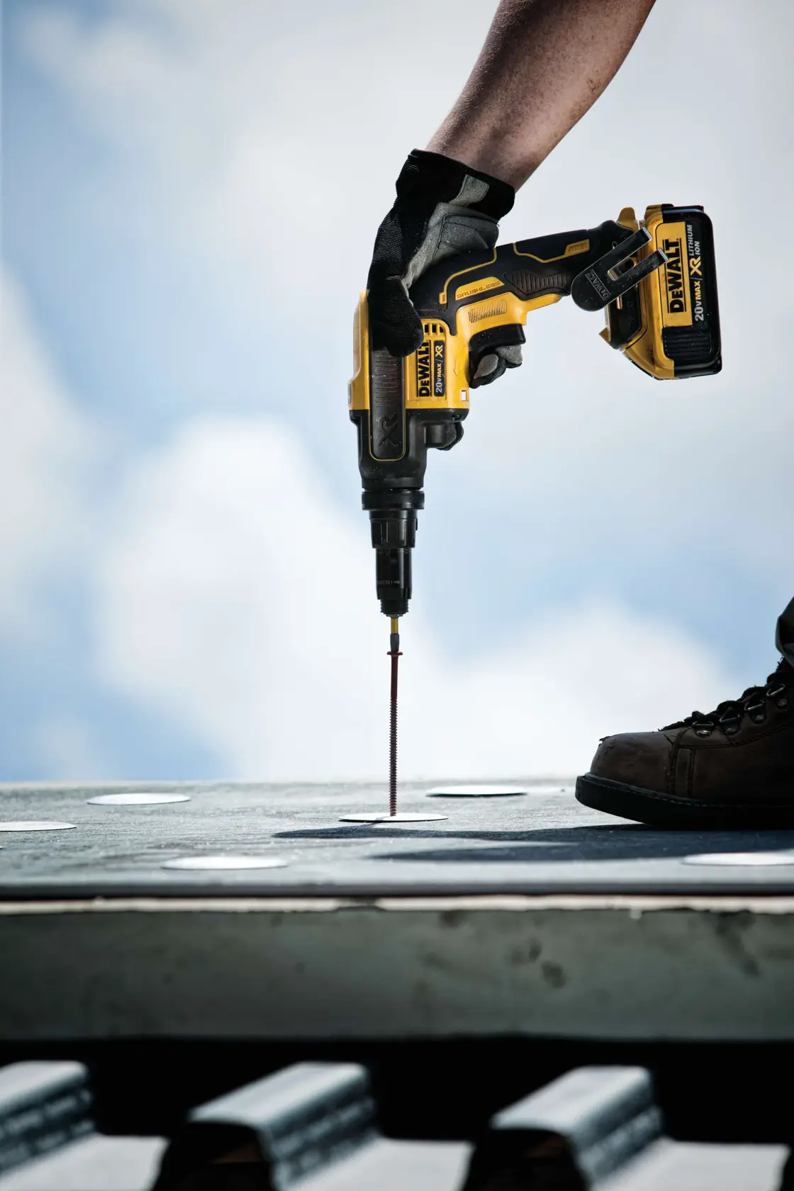 XR Versa-Clutch adjustable torque screw gun fastening long screw through surface.