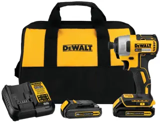 A DEWALT 20V Max brushless cordless impact driver kit, including a yellow and black fabric carrying bag, battery charger, two lithium-ion batteries, and the impact driver tool.