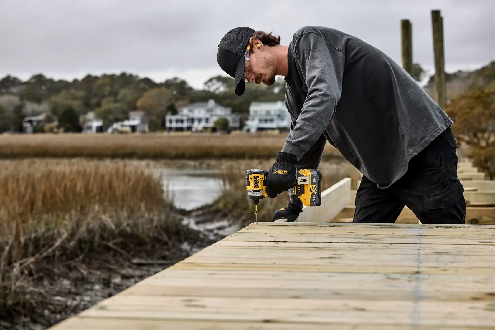 DEWALT 20V MAX XR(®) 3-Speed High Torque 1/4 in. Impact Driver Application Image Working on Dock
