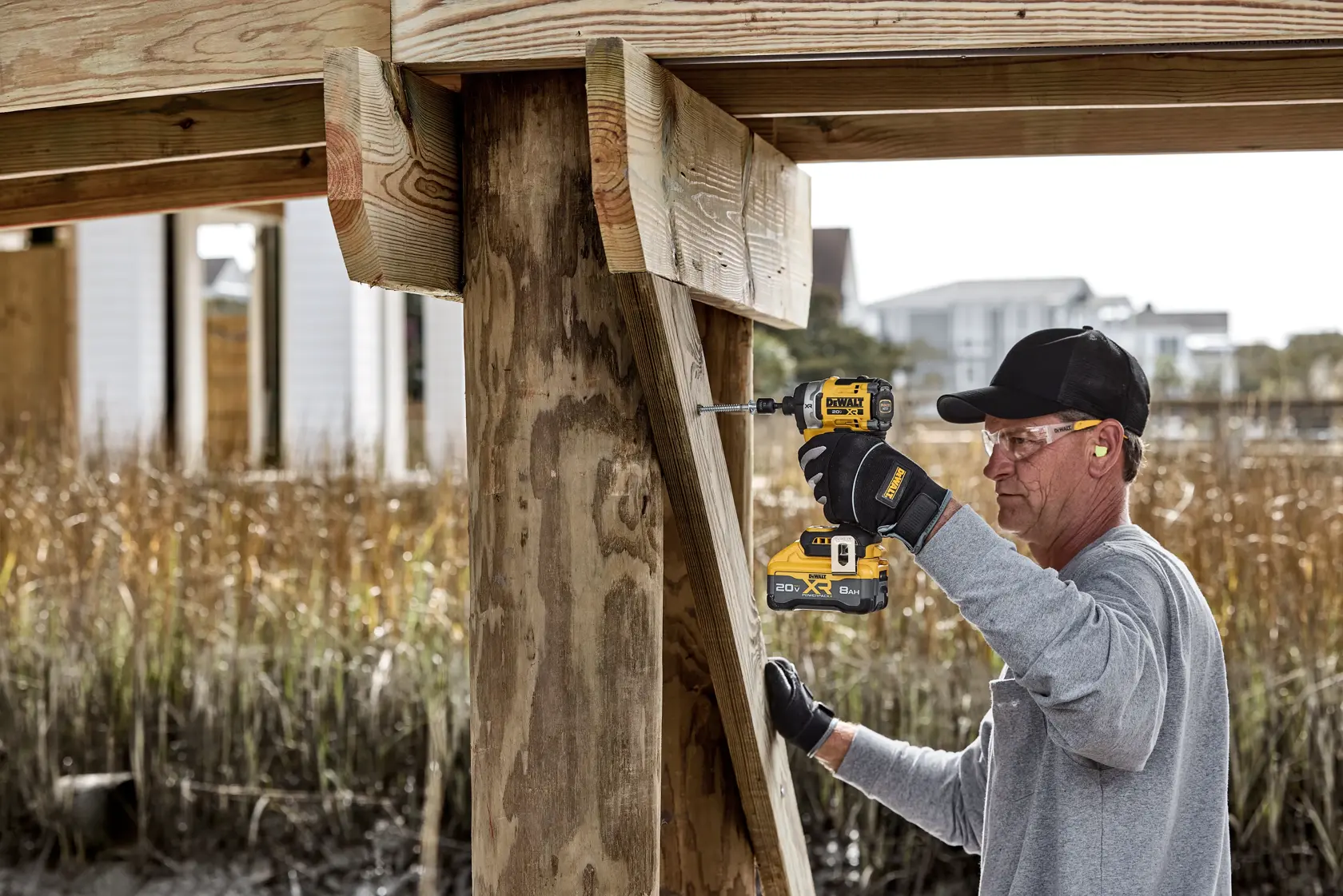 DEWALT 20V MAX XR(®) 3-Speed High Torque 1/4 in. Impact Driver Application Image Working Under Dock