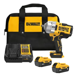 DCF961B Impact Wrench with two DCB205 batteries, a DCB1104 charger, and a soft carrying bag. The items are grouped to show the complete kit contents in a white background