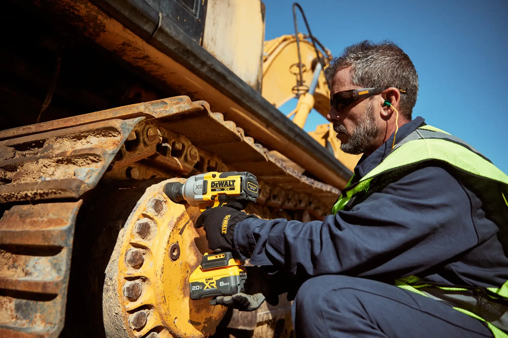 Worker using the 3/4inch High Torque Impact Wrench in wheel