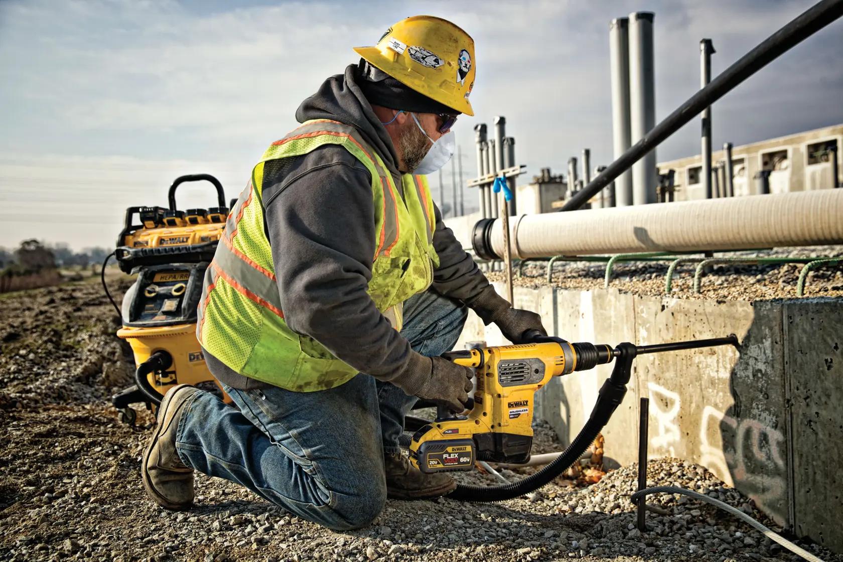 Brushless, cordless SDS MAX combination rotary hammer being used by a person