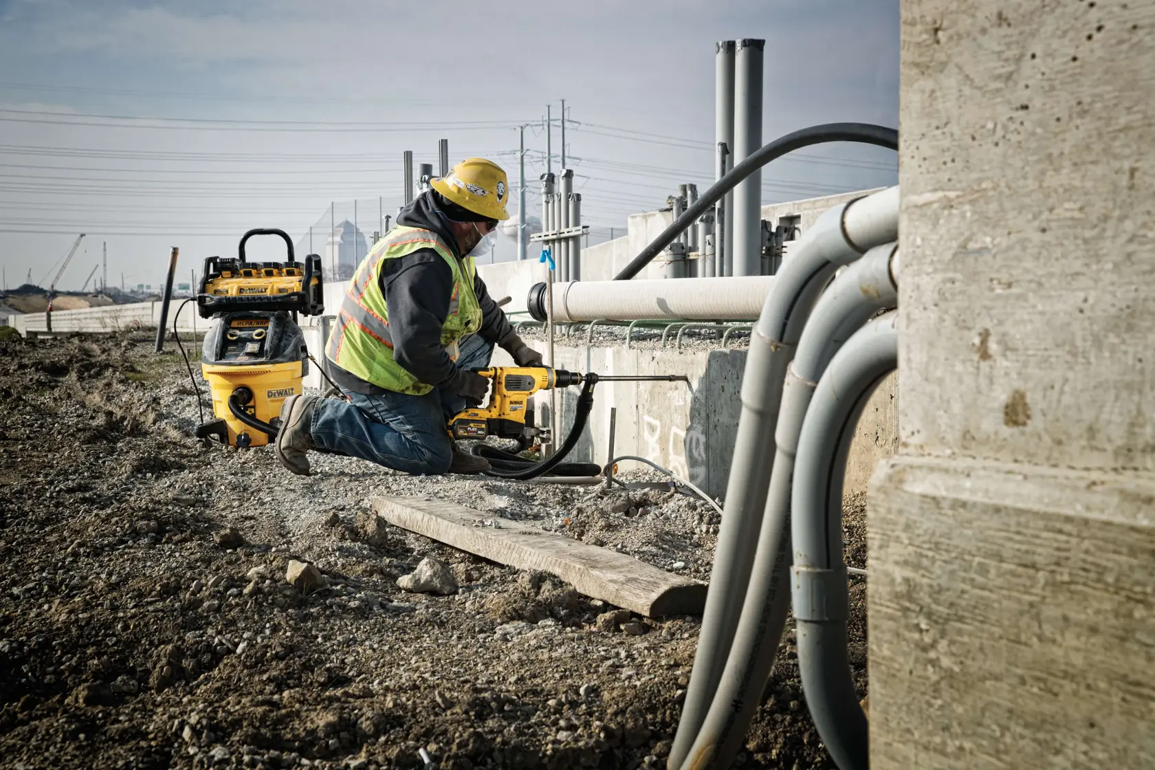 Brushless, cordless SDS MAX combination rotary hammer being used by a person