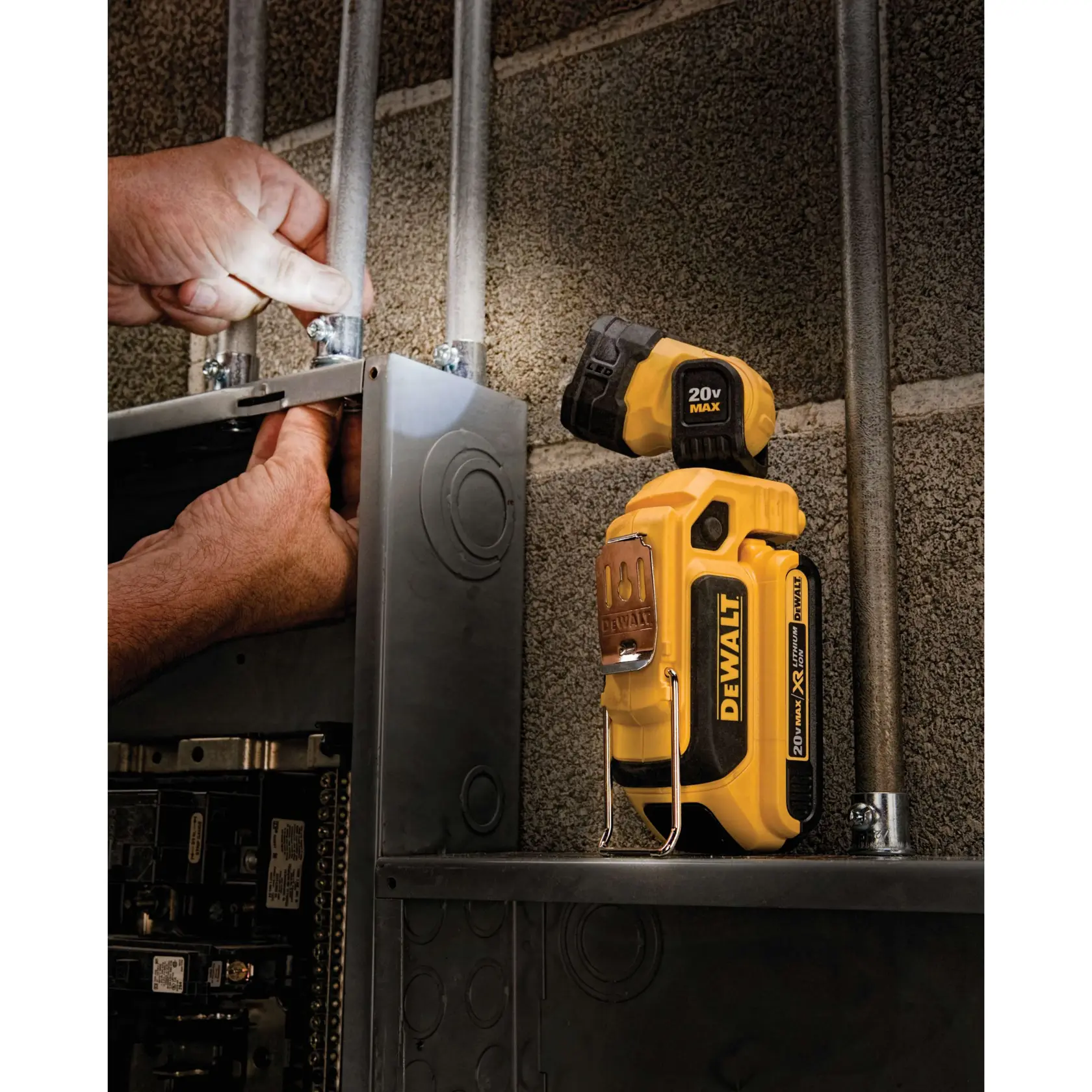 LED hand held worklight being used by a construction worker