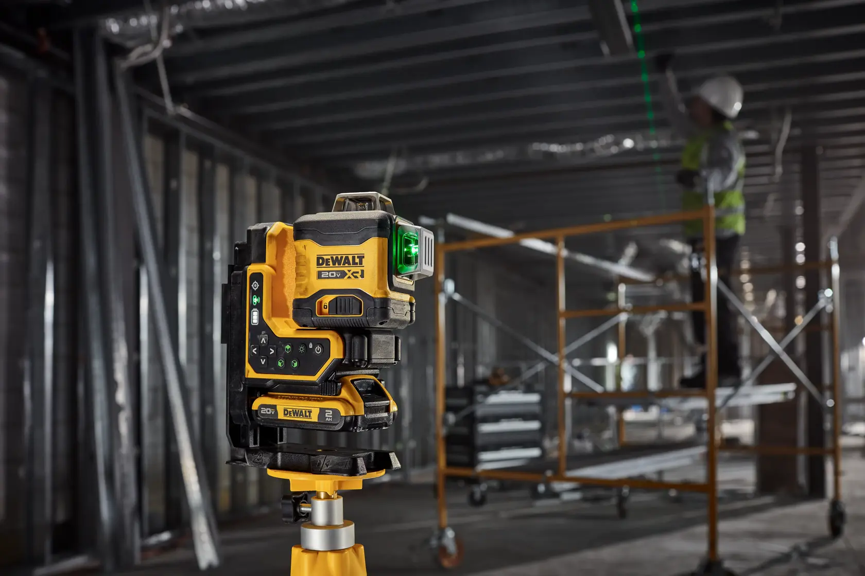 The 18V 3X 360 Remote Control Laser in use attached to metal frame with its magnetic bracket