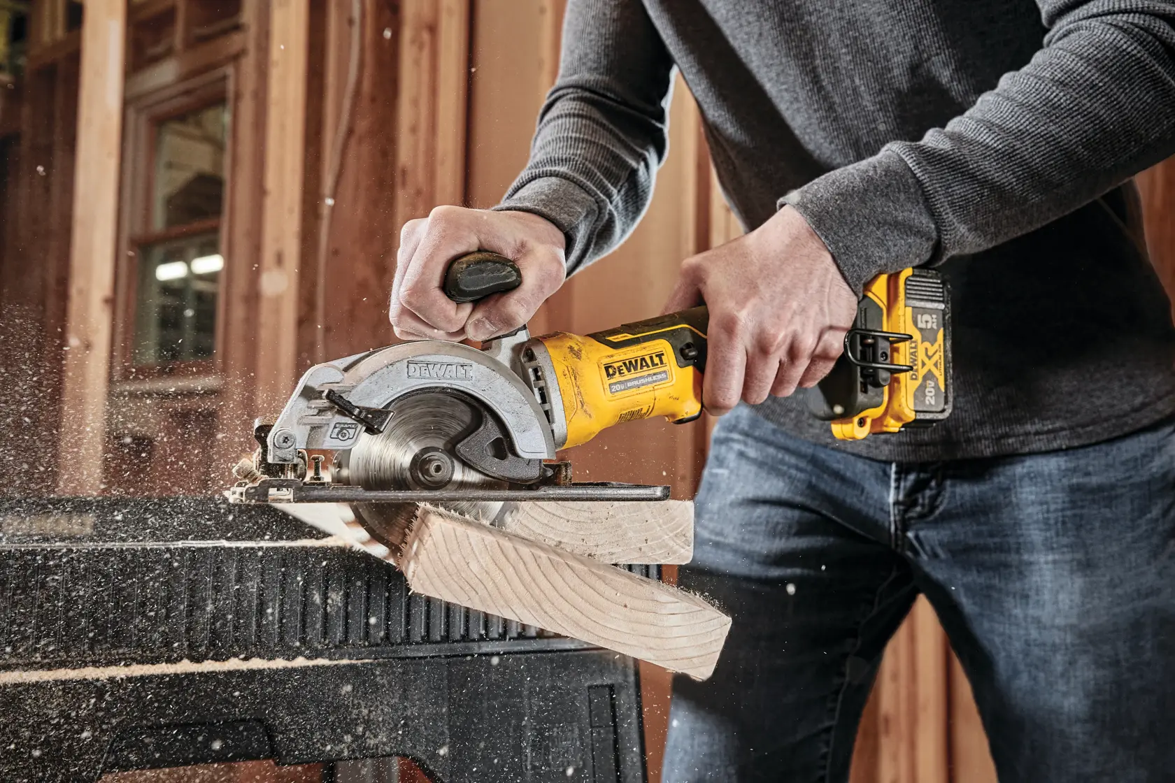 ATOMIC brushless cordless circular saw cutting wood.