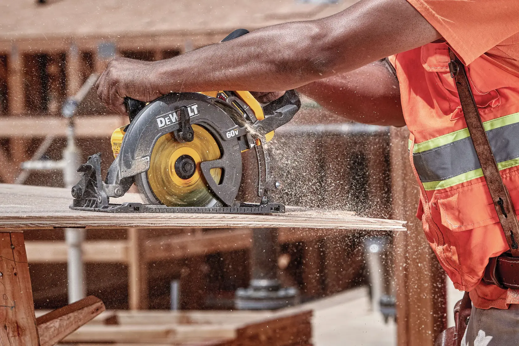 FLEXVOLT cordless worm drive style saw cutting wood.