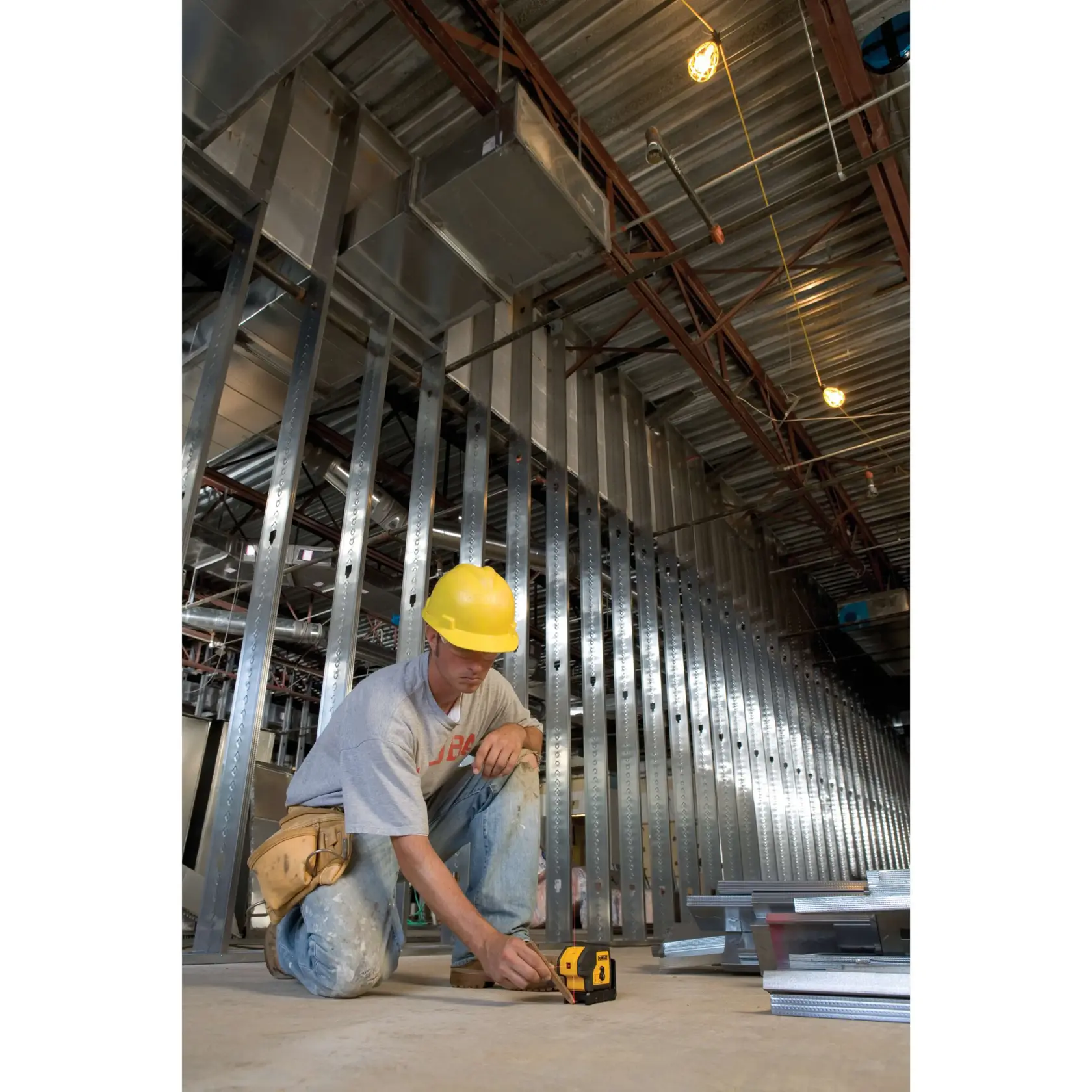 3 beam laser pointer being used by a construction worker.