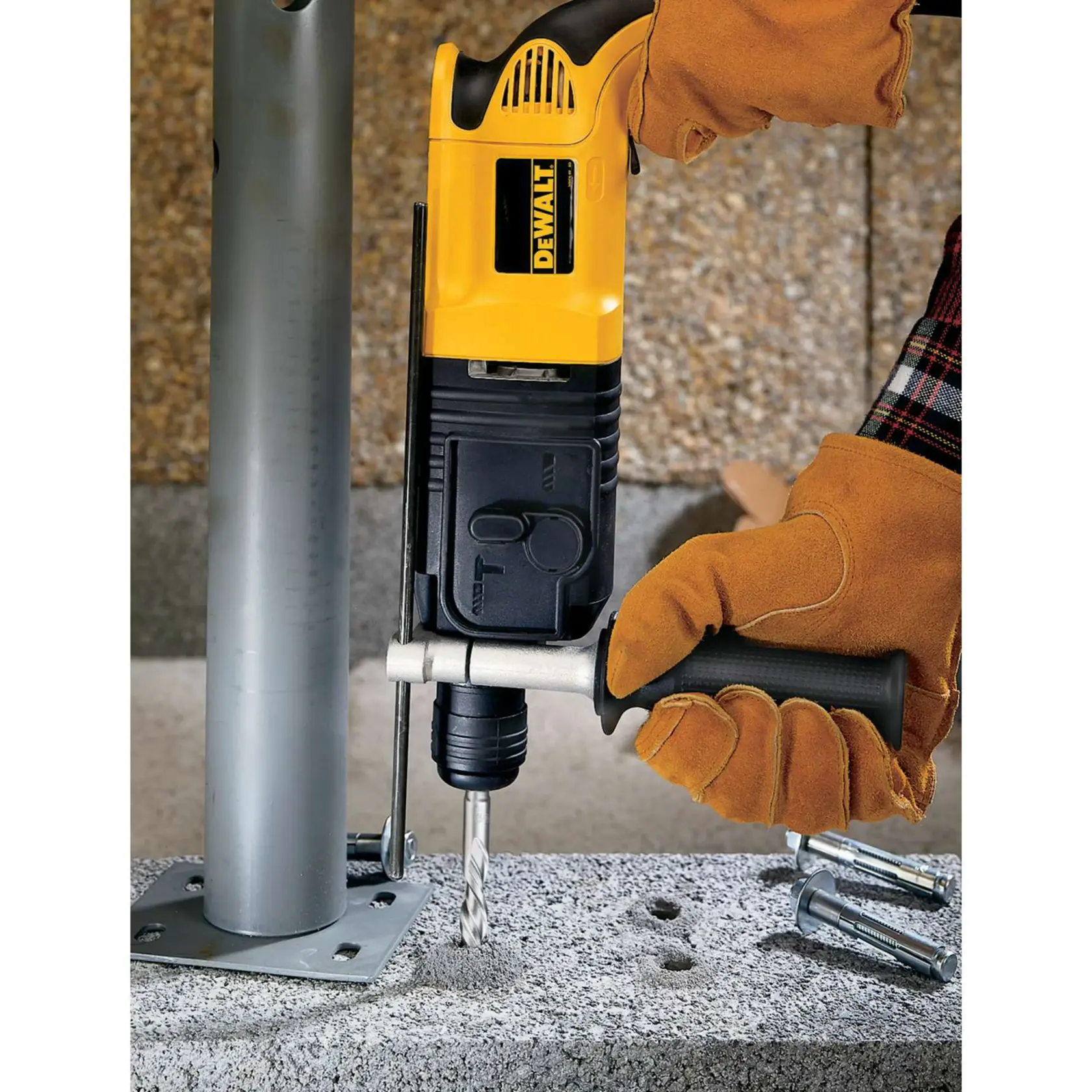 SDS Plus 2 Cutter Drill Bit being used to drill holes in concrete surface.