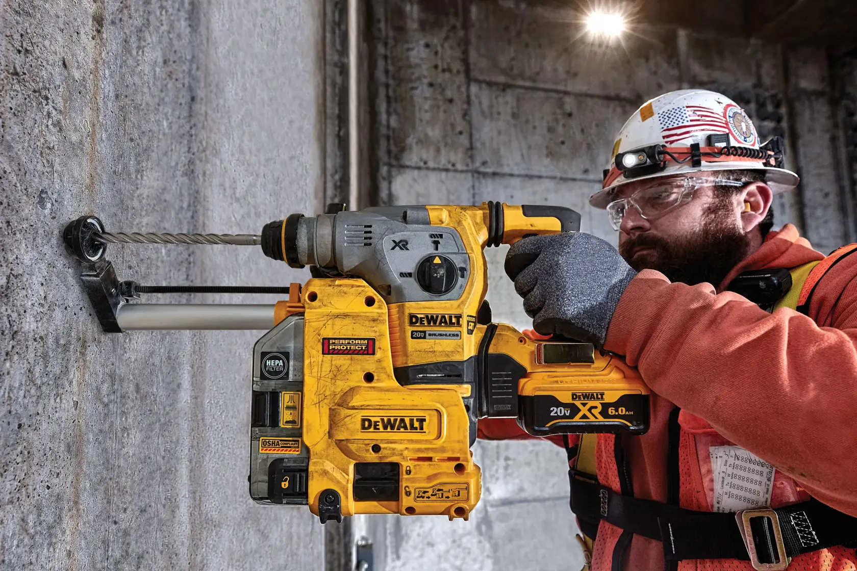 9 sixteenths inch by 10 inch by 12 inch S D S plus 2 cutter drill bits being used by a person to drill hole.