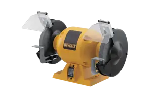 A DEWALT bench grinder with a yellow body, two grinding wheels on either side, and clear protective shields attached above each wheel.