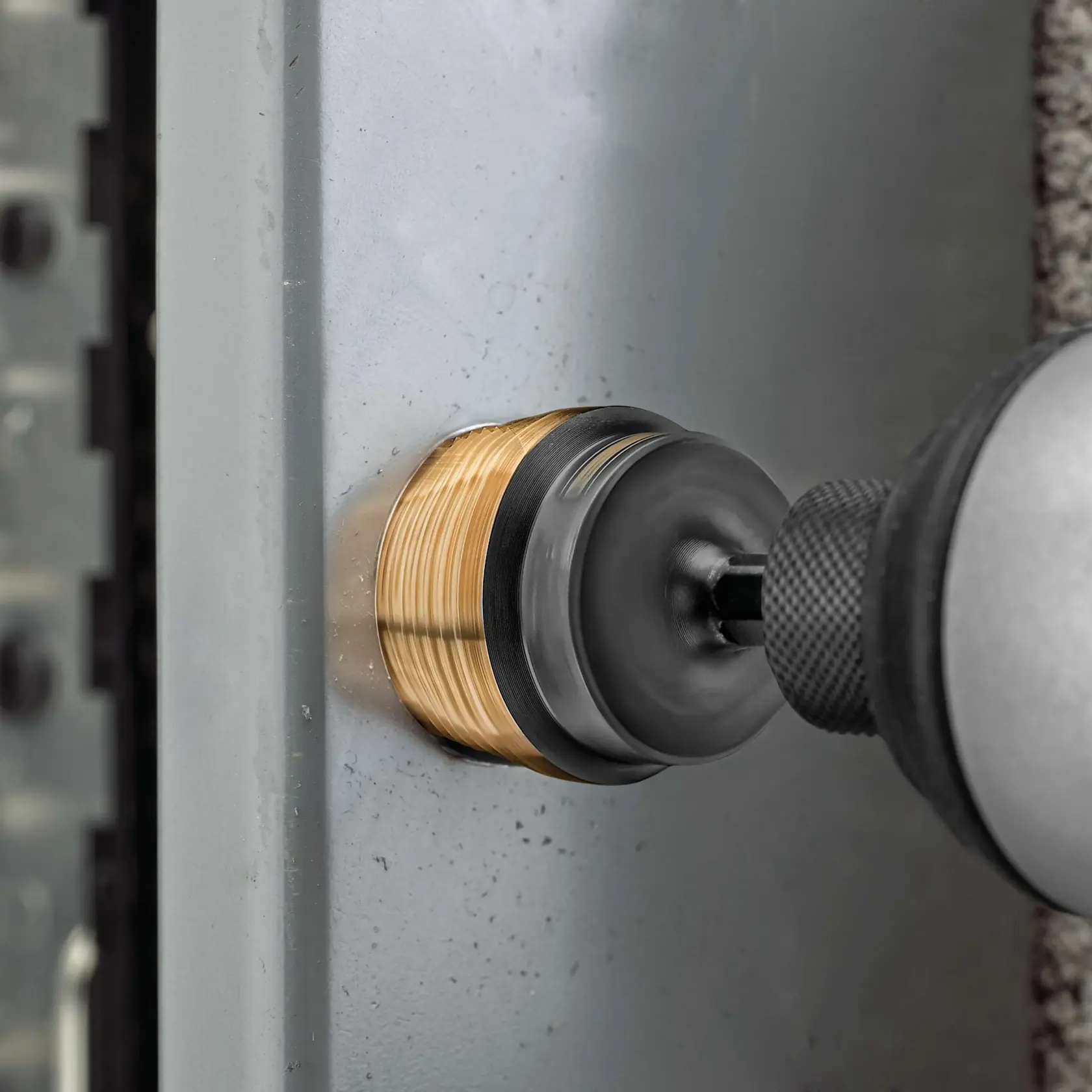 High speed steel 2 step drill bit in action.