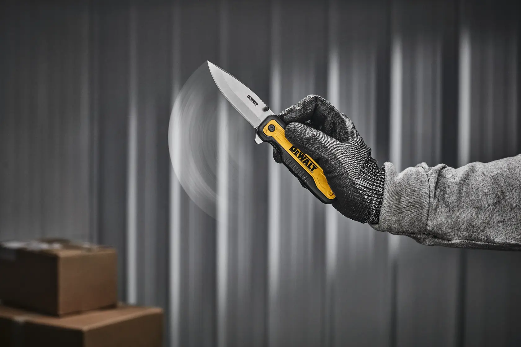 DEWALT pocket knife being flipped open with one handed push to release
