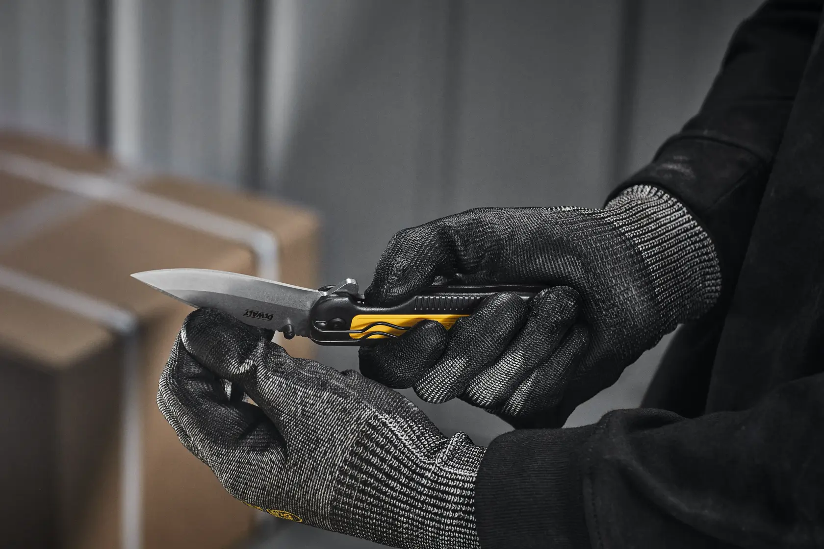 DEWALT pocket knife being opened by user