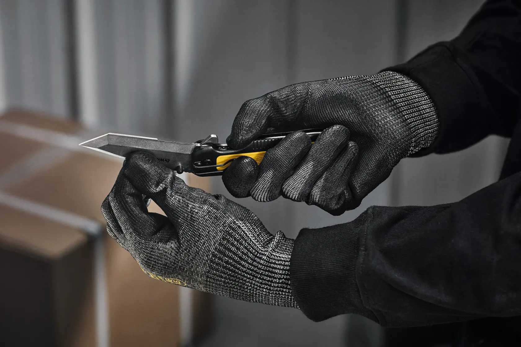 DEWALT pocket knife being opened by user