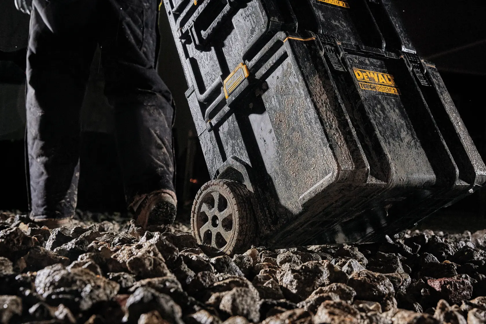 tough system 2.0 rolling toolbox being pushed over rocks.