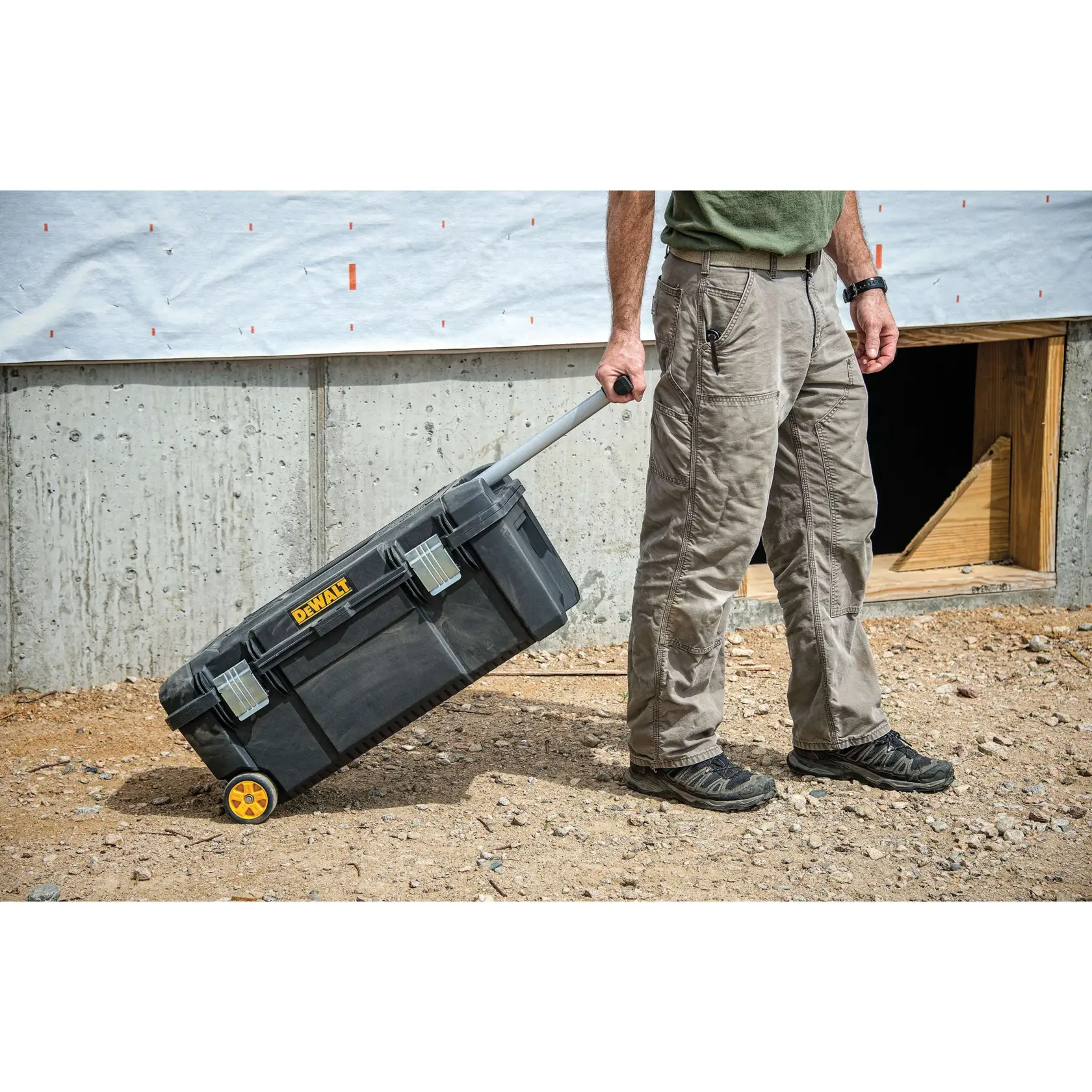 28 inch Tool box on wheels moving through telescopic handle.