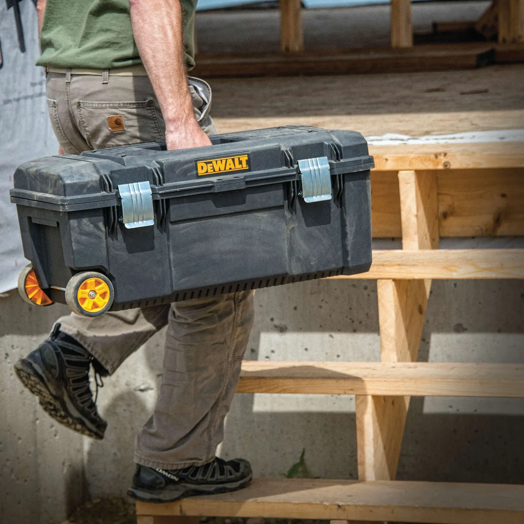 28 inch Tool box on wheels moving through carry handle.